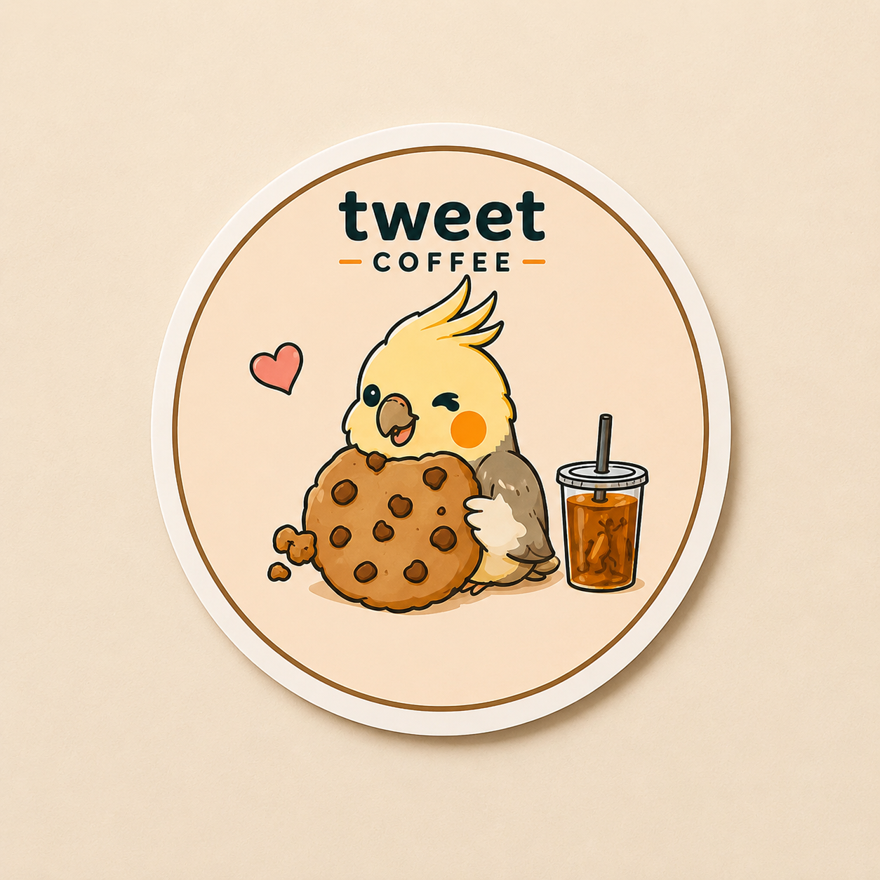 Tweet Coffee sticker with cockatiel holding a chocolate chip cookie beside an iced coffee