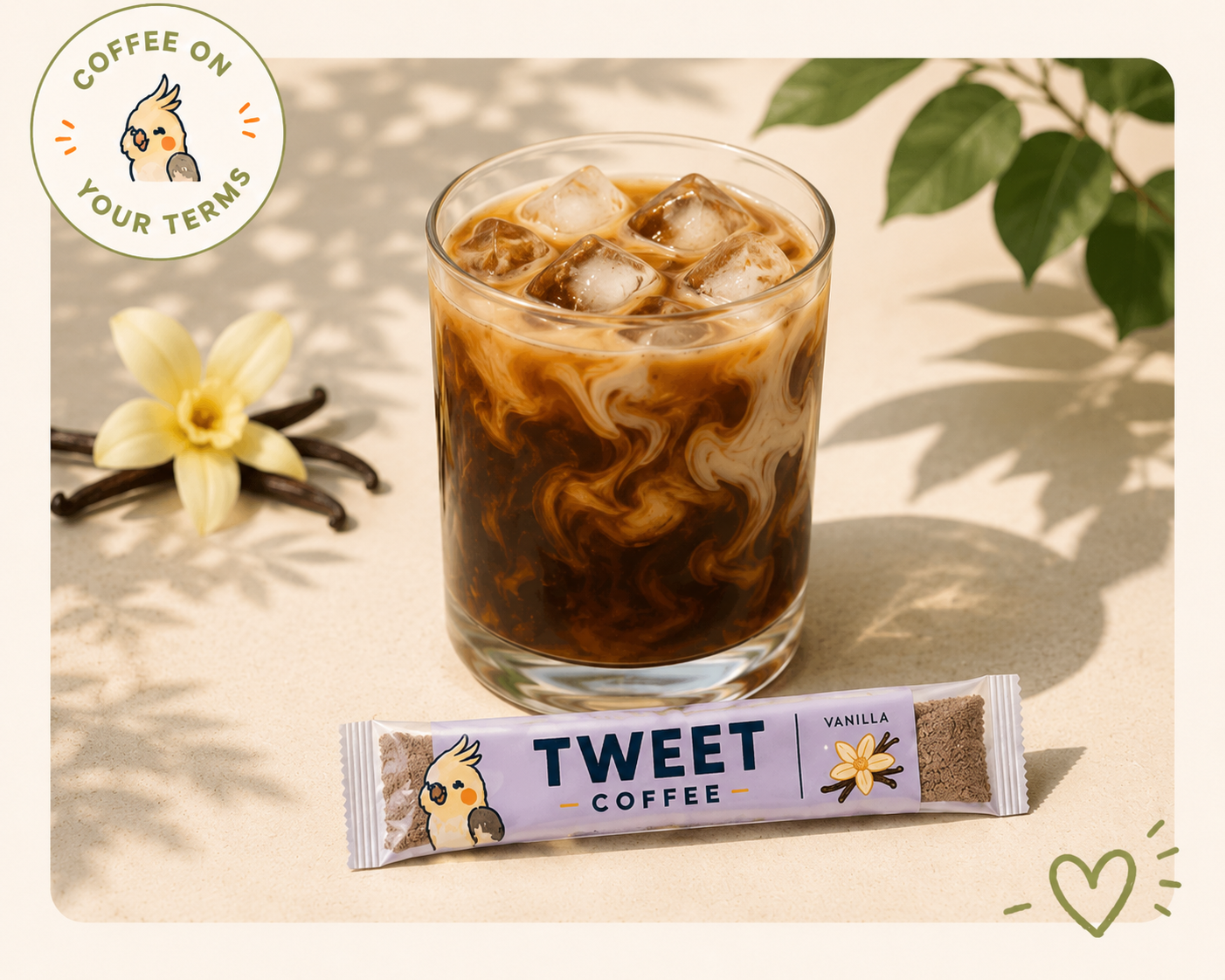 Tweet Coffee Vanilla instant iced coffee with ice and creamer beside a Vanilla coffee stick, representing coffee on your terms.